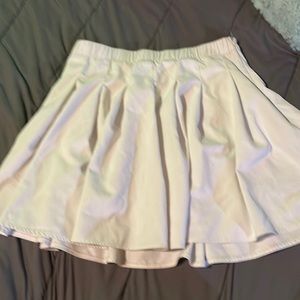White pleated skirt
